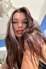 Ukrainian mail order bride Anastasia from Rivne with black hair and brown eye color - image 5