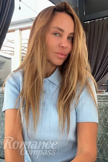Ukrainian mail order bride Tetiana from Odesa with blonde hair and green eye color - image 1