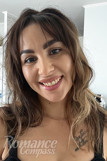Ukrainian mail order bride Anna from Kyiv with brunette hair and brown eye color - image 1