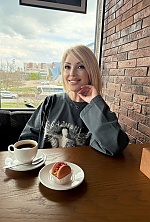 Ukrainian mail order bride Natalia from Odesa with blonde hair and hazel eye color - image 25