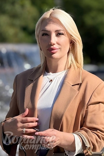 Ukrainian mail order bride Natalia from Odesa with blonde hair and hazel eye color - image 1