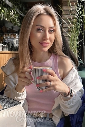 Ukrainian mail order bride Anna from Dnipro with blonde hair and green eye color - image 1