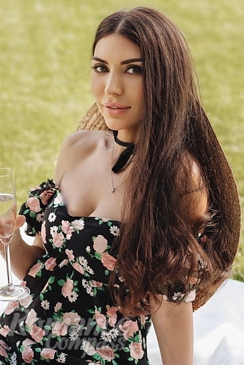 Ukrainian mail order bride Maryna from Kyiv with black hair and green eye color - image 1