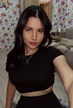 Ukrainian mail order bride Yuliia from Kyiv with black hair and grey eye color - image 3